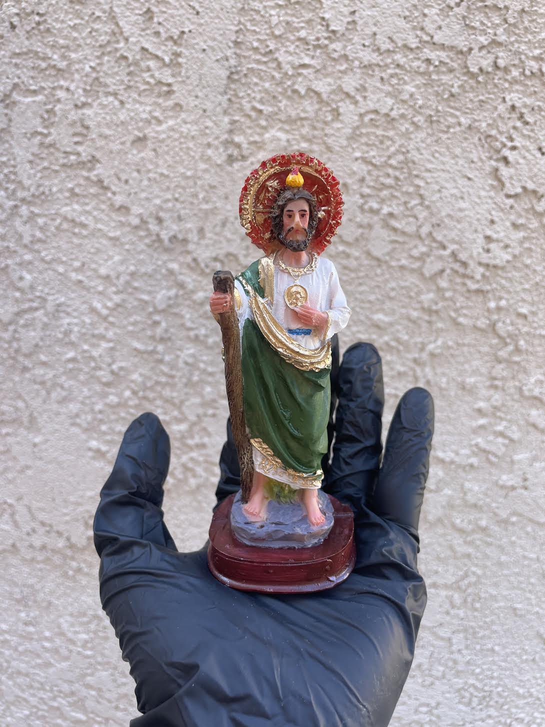 San Judas Tadeo devotional statue displayed on home altar prayer setup