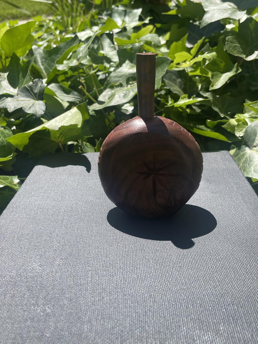 flask shaped chiltepin grinder