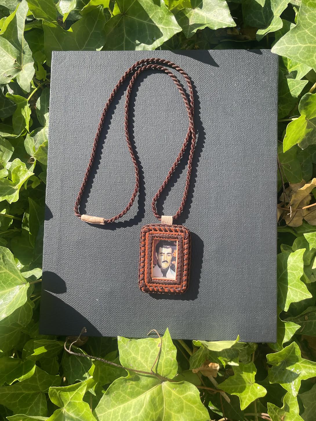 brown colored leather scapular 