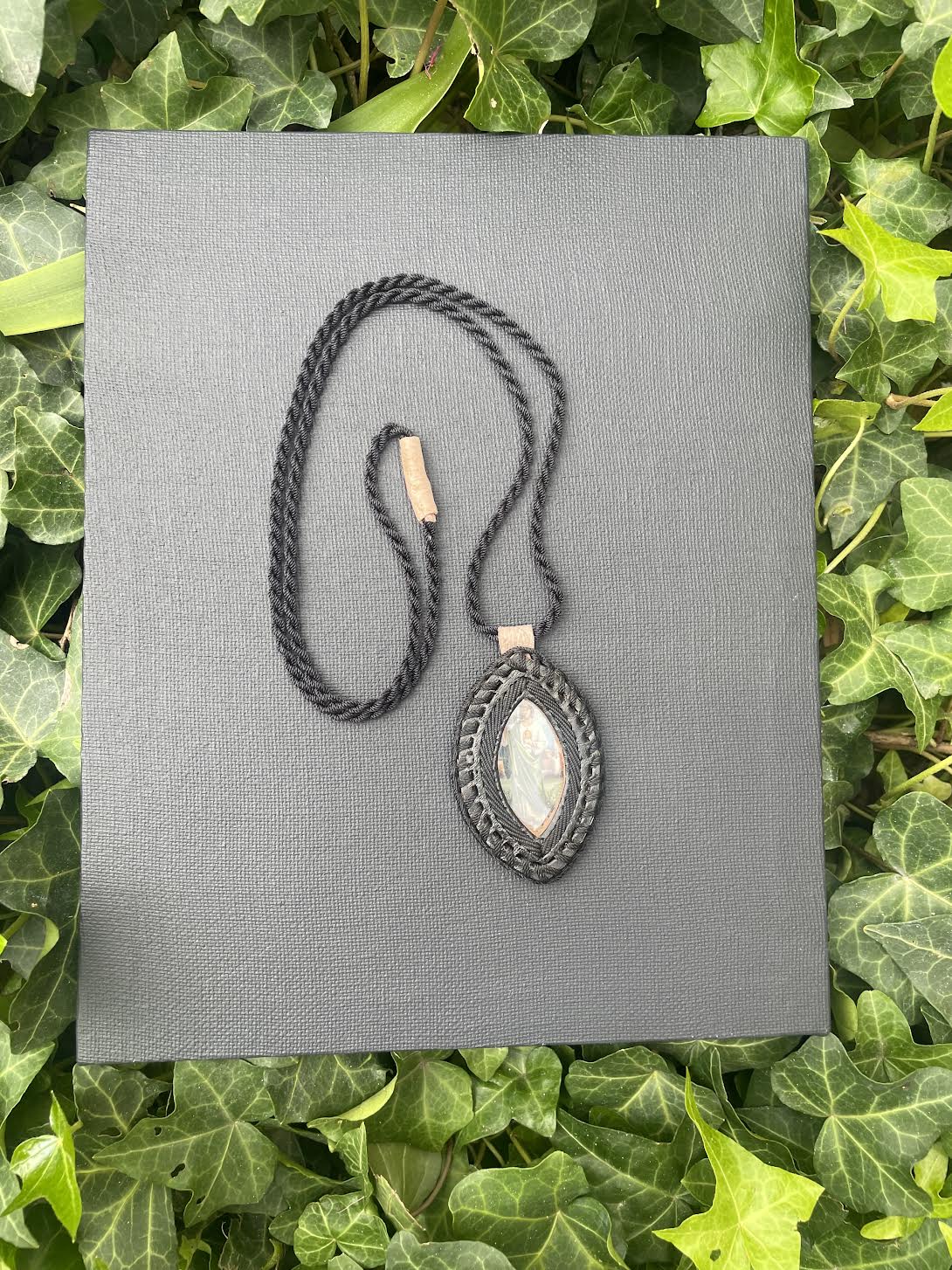 oval shaped leather scapular 